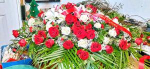 Casket spray all roses
