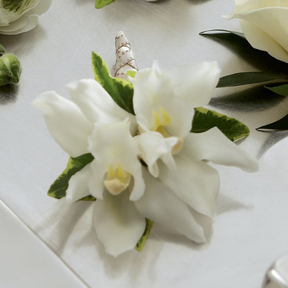 White Mini Cymbidium Boutonniere –  Rosemary Flower Shop Inc, Wappingers Falls NY